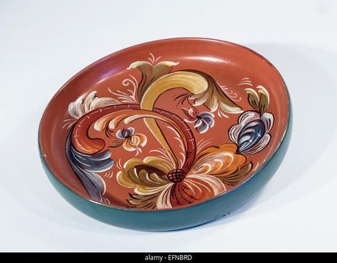 Rosemaling, traditional Norwegian decorative folk art painting, abstracted floral and plant motif on red and blue wooden bowl Stock Photo Norwegian Rosemaling, Norwegian Design, Wooden Bowl, Folk Art Painting, Wooden Bowls, Abstract Floral, Bold Colors, Folk Art, Stock Photography