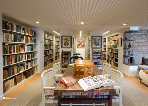 Basement Library, Brick Wall Living Room, Rec Rooms, Home Library Rooms, Basement Family Room, Library Wall, Basement Makeover, Brown Floors, Mid Century Living Room