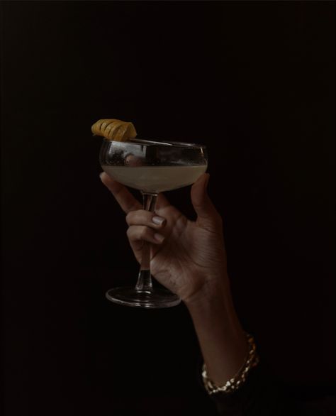 Champagne Glass Aesthetic Dark, Holding Champagne Glass Hands, Holding Martini Glass Pose, Holding Cocktail, Gothic Dinner, Person Reference, Hand Held Food, Hand Poses, Sitting Cross Legged