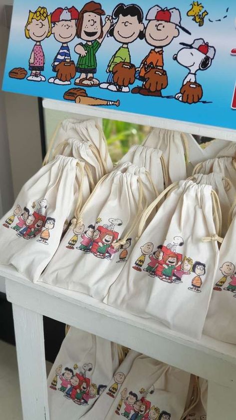 Quino's Snoopy Street Fair Birthday Party | CatchMyParty.com Peanut Themed First Birthday, Snoopy Party Favors, Peanuts Themed Birthday Party, Peanuts Birthday Party Ideas, Peanuts Party Ideas, Snoopy Birthday Ideas, Snoopy Party Decorations, Snoopy Birthday Party Ideas, Snoopy Party Ideas