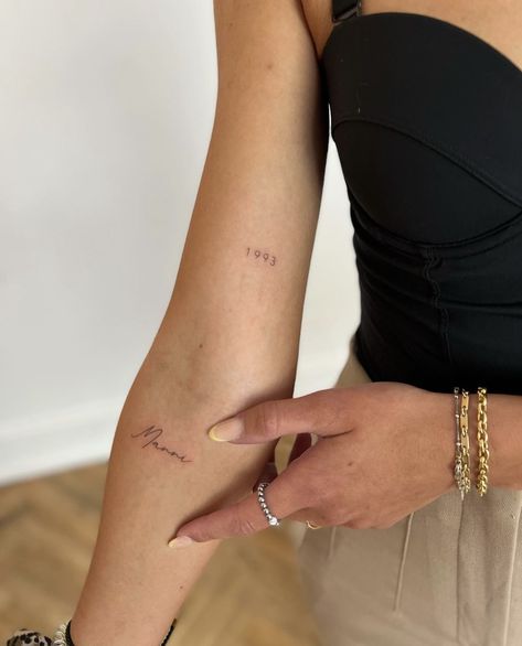 Year Tiny Tattoo, Fine Line Signature Tattoo, Date Tattoo Fine Line, Date Tattoo Above Elbow, Inner Arm Tiny Tattoo, Fine Line Birth Year Tattoo, Dainty Number Tattoo Placement, Lots Of Love Tattoo, Date Tattoo Minimalist