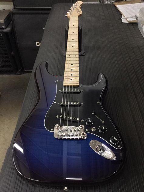 G&L Musical Instruments Here's an S-500 in Blueburst over flame maple on swamp ash, 3-ply black guard, quartersawn maple neck with Light Tint Satin finish. Guitar Colors, G&l Guitars, Blue Guitar, Black Electric Guitar, Guitar Making, Guitar Tabs Songs, Instruments Art, Electric Guitar Design, Guitar Obsession