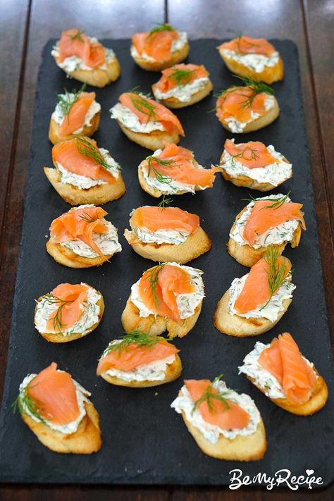 Smoked Salmon Crostini with Herb Cream Cheese Recipe Smoked Salmon Crackers Cream Cheese, Seafood Party Dishes, Salmon And Cream Cheese Appetizers, Seafood Finger Foods For Party, Smoked Salmon Crackers, Smoked Salmon Roll Ups, Salmon Hors D’oeuvres, Christmas Shrimp Appetizers, Salmon Canape