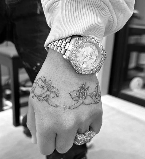 Two Angels Tattoo Men, 4in Tattoos, Aries Angel Tattoo, Angel Tattoo On Hip, Good Angel Bad Angel Tattoo Ideas, Angelic Back Tattoo, Cloud And Angel Tattoo, Thigh Tattoos Women Not Flowers, Angels Touching Hands Tattoo