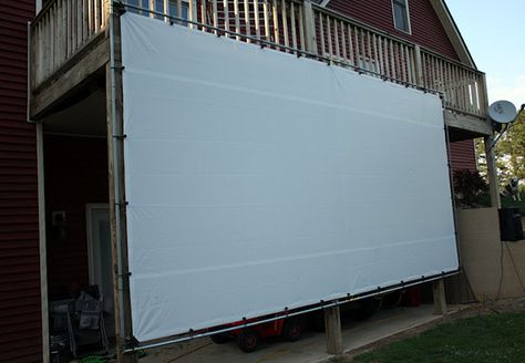 On the House-framed tarp screen for outdoor movies Projector Screen Diy, Diy Outdoor Movie Screen, Outdoor Projector Screen, Backyard Movie Theaters, Outside Movie, Outdoor Movie Theater, Outdoor Movie Screen, Backyard Movie Nights, Outdoor Projector