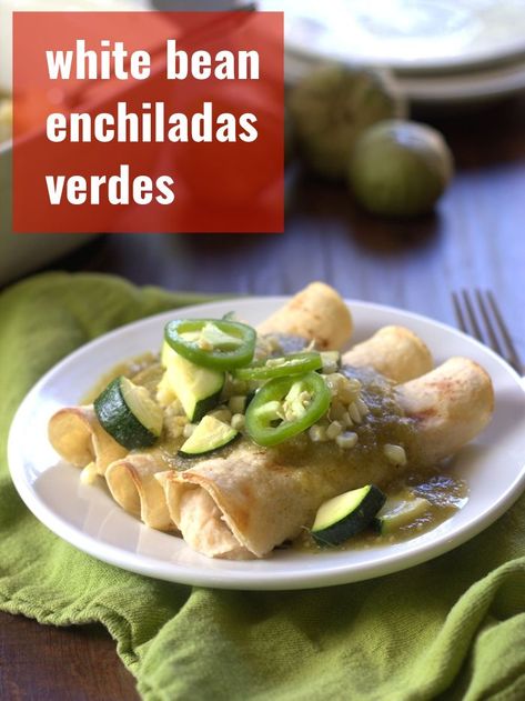 Creamy white beans are blended up, stuffed into corn tortillas and smothered in spicy tomatillo sauce to make these scrumptious vegan enchiladas verdes! A delicious Mexican-inspired vegetarian dinner that everyone can enjoy! #enchiladas #mexicanrecipes #veganrecipes White Bean Enchiladas, Creamy White Beans, Corn And Zucchini, White Bean Recipes, Healthy Vegan Dinner Recipes, Tomatillo Sauce, Vegan Enchiladas, Vegan Entrees, Vegetarian Enchiladas