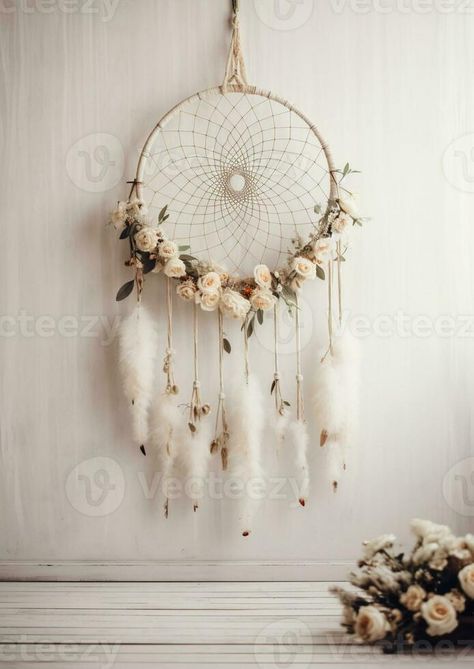 there is a white dream catcher hanging on a wall with flowers. generative ai. Wall With Flowers, Vector Snowflake, White Dream Catcher, Crafty Ideas, Dream Catcher, Vector Free, Photo And Video, Flowers, Wall