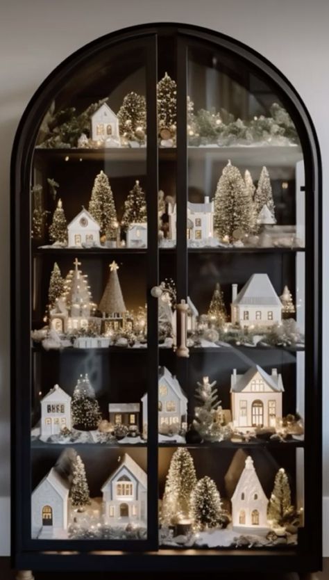 Christmas Decor Contemporary, Christmas Village Home Decor, European Style Christmas Decor, Black Neutral Christmas Decor, Christmas Decor For Modern House, Xmas Village Ideas, Curio Cabinet Christmas Decor, Mini Sleigh Decorating Ideas, Christmas Aesthetic Modern