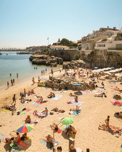 A lively day at the beach at Cascais's Praia da Conceição, a 20 minute train ride from Lisbon, Portugal. For more on the best day trips in Lisbon and how to plan a trip to Portugal, read this travel guide. | The Longest Weekend #lisbon #lisbonitinerary #lisbonthingstodo #cascais #cascaisportugal #lisbontravelguide Lisbon Day Trips, Lisbon Beaches, Lisbon Itinerary, Lisbon Portugal Travel, Day Trips From Lisbon, Cascais Portugal, Portugal Beach, Portugal Vacation, Lisbon Travel