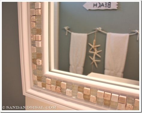 How to decorate a mirror with tile.  Also links to a tutorial of how to make a FRAME for your bathroom mirror (something I've wanted to do for years! :) Decorate A Mirror, Decorate Mirror, Tiled Mirror, Plain Mirror, Tile Border, Beach Theme Bathroom, Frame Diy, Tile Mosaic, Diy Tile