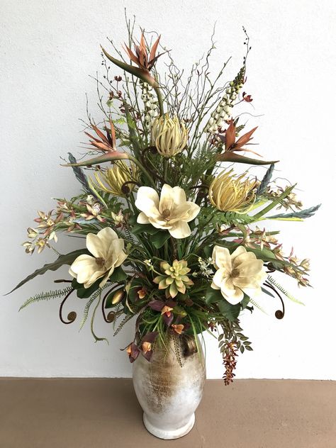 6ft tall magnolia floral arrangement designed by Arcadia Floral and Home Decor. Tall Vase Arrangements, Tall Flower Arrangements, Tall Floral Arrangements, Home Flower Arrangements, Home Decor Floral Arrangements, Large Floral Arrangements, Large Flower Arrangements, Spring Floral Arrangements, Artificial Floral Arrangements