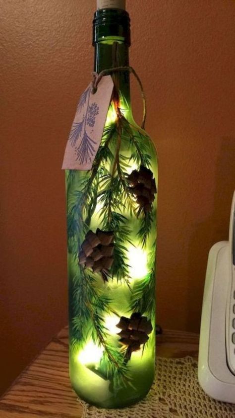 Beautiful Lighted Bottles | creativeartworksblog Wine Bottle Project, Hand Painted Wine Bottles, Glass Bottle Diy, Wine Craft, Bottle Craft, Christmas Wine Bottles, Diy Glass Bottle Crafts, Wine Bottle Art, Wine Bottle Diy Crafts