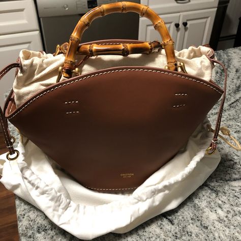 New To Poshmark Use My Code Chenmin0755 To Save $10 New With Tags And Dust Bag Medium Size Leather &Bamboo Top Handle Bucket Bag Tory Burch Bucket Bag, Gucci Clutch Bag, Dream Bag, Clutch Purse Black, Gucci Clutch, Canvas Leather Tote, Bamboo Top, Large Leather Tote Bag, Black Leather Tote Bag