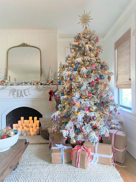 Anthropologie Inspired Christmas Tree, Christmas Decorations Coffee Table, Flocked Decorated Christmas Tree, Grand Millenial Christmas Tree, Snow Flocked Christmas Tree Decor, Living Room Christmas Tree, Colorful Flocked Christmas Tree, Pink Christmas Mantle Decor, Christmas Tree Decorated