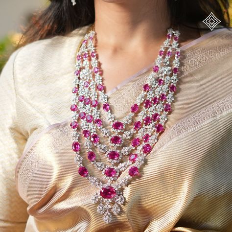 Under the radiant glow of Diwali lights, let your beauty shine with unmatched brilliance. Our exquisite 18K gold necklace, adorned with fancy-shaped diamonds and vibrant pink-red gemstones, captures the essence of the festival. This masterpiece reflects the joy and warmth of traditional celebrations, adding a touch of timeless elegance to your festive attire. WhatsApp 9964641869 for enquiries. 📍Visit the Blue CKC&Co. Flagship store, near Safina Plaza. Look for the DIAMOND logo! Sarees: @h... Pearl Bangles Gold, South Jewellery, Diamond Haram, Diamond Jewlery, Pink Stone Necklace, Pearl Bangles, Bridal Diamond Necklace, Festive Attire, Real Diamond Necklace