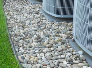 rocks around AC unit Landscaping Around House, Landscape Borders, River Rock Landscaping, Landscape Stone, Backyard Pool Landscaping, Ponds Backyard, Landscaping Tips, Air Conditioners, New Rock