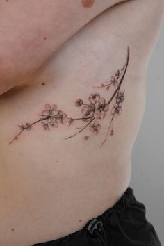 Cherry Tree Branch Tattoo, Poppy Rib Tattoo, Japanese Rib Tattoo, Sakura Branch Tattoo, Cherry Blossom Rib Tattoo, Swaggy Tattoos, Cherry Tree Tattoo, Apple Blossom Tattoos, 40 Tattoo