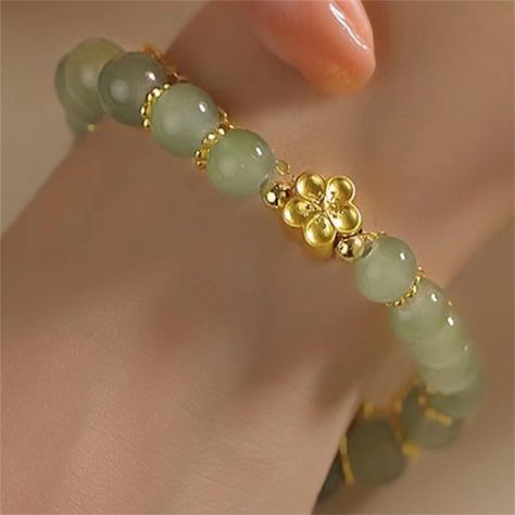 PRICES MAY VARY. ✅【2024 Hetian Jade Bracelet】The hetian jade gold Daisy bracelet is the means of holding back peace and keep happiness.Jade is a symbol of serenity and purity. It signifies gathered in tranquility.It increases love and nurturing.This jade bracelet can bring good luck and success to the wearer.Every piece is different in color and inside construction. ✅【Hetian Jade Elegant Bracelet】Hetian jade bracelet uses high-quality natural jade, exquisite workmanship, smooth surface, and comf Jade Beaded Bracelets, Daisy Bracelet, Flower Crystal, Hetian Jade, Jade Bracelet, Elegant Bracelet, Natural Jade, Bracelets For Women, Jade Beads