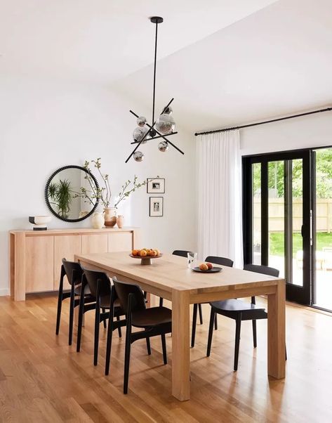 27 Modern Dining Room Ideas and Designs Oak Table With Black Chairs, Oak Table Black Chairs, Table With Black Chairs, Sliding Glass Door Coverings, Glass Door Coverings, Scandi Dining Room, Dining Room Window Treatments, Dining Room Decor Ideas, Black Chairs