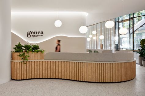 Genea Fertility's new east Melbourne, Australian flagship clinic marks a welcome design-first for fertility clinics in Australia with its day-spa-like aesthetic. The space evokes a sense of calm with soft lighting and curves, marking a new era for the design of fertility clinics.  #SparkBrilliance #corporatedesign #experientialdesign #lifesciencesdesign #workplacedesign Clinic Building, Future Workplace, Wellness Center Design, Fertility Clinic, Base Building, Welcome Design, Corporate Interiors, Center Of Excellence, Clinic Design