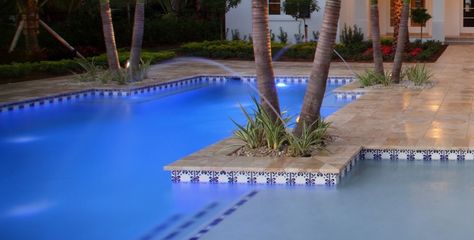 Beautiful Mexican tile border designs at waterline and along the steps. Pool Tile Designs, Swimming Pool Fountains, Mediterranean Pool, Relief Tiles, Patio Bathroom, Mexican Tiles, Swimming Pool Tiles, Talavera Tile, Pool Remodel