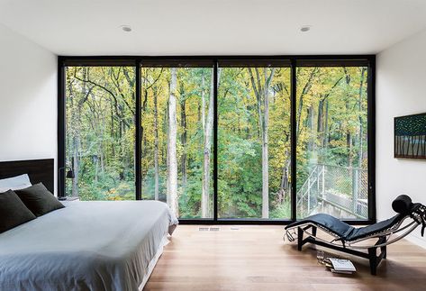 Floor-to-ceiling windows let the woodlands into this bedroom. Modern Window Design, Multigenerational Living, Rustic Bedroom Design, Light Hardwood Floors, Bedroom Design Inspiration, Floor To Ceiling, Modern Windows, Bedroom Windows, Modern Cabin