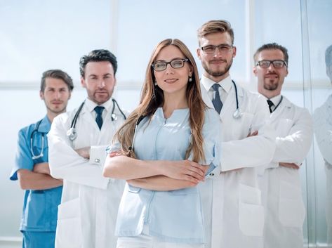 Group of doctors and nurses standing in ... | Premium Photo #Freepik #photo #white-coat #happy-doctor #hospital-staff #doctor-smile National Nurses Day, Nutrition Sportive, Acute Care, Staffing Agency, Medical Coding, Nurses Day, Medical University, Elderly Care, Medical College