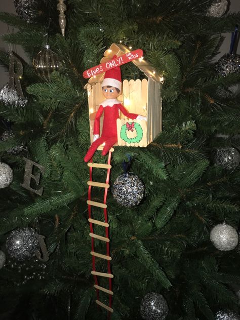 Built this with the popsicle sticks and I stringed the treehouse with a battery operated light for Klyde (elf) to hang in his hideout How To Upgrade Elf On The Shelf, Elf On The Shelf Club House, Elf On The Shelf Popsicle Sticks, Elf On The Shelf Ideas Popsicle Sticks, Popsicle Stick Tree House, Elf On The Shelf Tree House, Elf House Ideas, Elf On The Shelf Gingerbread House Ideas, Elf On The Shelf Diy Kits