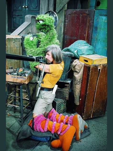 "One of THE best photos of Caroll Spinney performing Oscar while still partly dressed as Big Bird." - Brian Knatchbull, The Jim Henson Hour. Sesame Street Characters, Fraggle Rock, Oscar The Grouch, The Muppet Show, Jim Henson, Big Bird, Scene Photo, Street Photo, How To Make Shorts