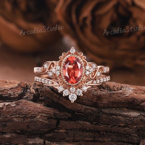 The design inspiration for this ring is akin to unfolding petals, capturing the delicate beauty of a blooming flower. The central gemstone represents the heart of the flower, while the intricate metalwork symbolizes the intertwining vines and leaves. The overall effect is one of timeless romance and natural elegance.🌿🌸 Natural Oval Shaped Sunstone Engagement Ring Set Vintage Leaf Sunstone Ring Unique Orange Gemstone Ring Bridal Set Anniversary Gifts for Her If you want to see more pictures of Sunstone Engagement Ring, Sunstone Ring, Anniversary Gifts For Her, Ring Rosegold, Floral Ring, Unique Gifts For Women, Engagement Ring Set, Women Ring, Diamond Cluster Ring