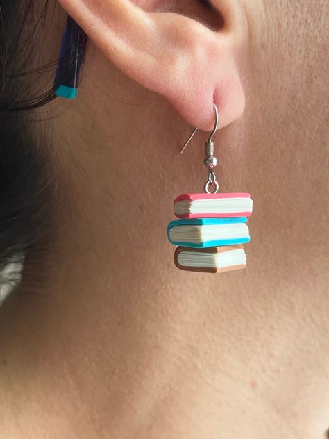 Book Earrings, Pile of Books Teacher Earrings, Polymer Clay Jewelry, Stack of Books, Fun Dangle Charm Book Lover Earrings, Teacher Gifts, Back to School Gifts. Handmade with love. Unique gift for teachers, students, lawyers, officiants, etc.. Polymer clay earrings measures approx. 0.7"h x 0.6"w (18 x 15 mm)  Due to the handmade nature of our products there may be some small variations between each item. We believe this makes each handmade product completely unique. If you have any questions at a Cute Clay Accessories, Small Clay Things To Make, Fun Earrings Diy, Fun Polymer Clay Earrings, Cute Clay Jewelry, School Earrings, Clay Earrings Cute, Clay Book, Polymer Clay Charms Diy