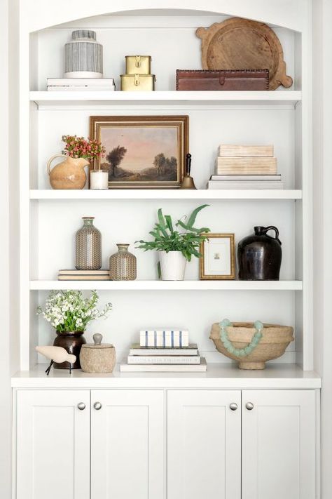 Our Stylist's Guide to Bookshelf Styling | Bria Hammel Interiors White Book Shelf, Bookshelf Styling Living Room, Bria Hammel Interiors, Bria Hammel, Styling Bookshelves, Built In Shelves Living Room, Shelf Decor Living Room, Decorating Bookshelves, Bookshelves In Living Room