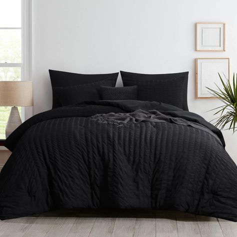 PRICES MAY VARY. Elevate your bedscape with the charming textured touch of our king comforter set - a comforter 102" x 90" and 2 coordinating pillow shams 20" x 36" included. The seamless blend of the seersucker front and brushed microfiber reverse effortlessly combines style and comfort. The 300gsm animal-friendly polyfiber filling has been specifically chosen to strike a balance between warmth and breathability. The lightweight yet fluffy design ensures a cozy feel without the burden of excess Fluffy Comforter Sets, Fluffy Comforter, Bed Comforter, Black Headboard, Bed Comforter Sets, Black King, King Comforter Sets, Black Bedding, King Comforter