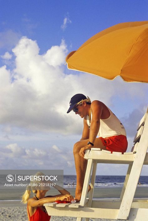 1980s Lifeguard Talking To Woman On Beach Lifeguard Pose Reference, 80s Lifeguard, Woman On Beach, Lifeguard Chair, Beach Lifeguard, Life Guard, Vintage Surf, Summer Pool, Direct Marketing