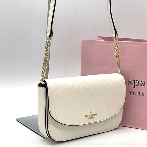 Brand New With Tag Kate Spade New York Kristi Crossbody Bag Product Details Measurements 8" W X 5.1" H X 1.2" D Color: Meringue Features Metal Pinmount With Spade Logo Closure Type: Flap With Magnetic Snap Closure Dust Bag Included: No Interior: 6 Credit Card Slots Exterior: Front Slip Pocket Materials Refined Grain Leather Lining: Two Way Spade Jacquard Lining Imported Style Number Ka698 Kate Spade New York Handbags, Kate Spade White Bag, Kate Spade Bag Aesthetic, Kate Spade Purse Outfit, Kate Spade Aesthetic, Purses Kate Spade, Cool Bags, Classy Purses, Purse Outfit