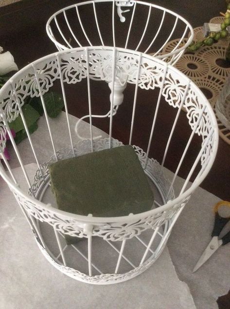 White Birdcage Centerpiece, Birdcage Centrepiece Wedding, Birdcage Miniature Room, Decorating Bird Cages For Christmas, Metal Bird Cage Decor Ideas, Decorative Cages Ideas, French Country Bird Cage Decor, Bird Cage Centerpiece Table Decorations, Decorating Birdcages Ideas