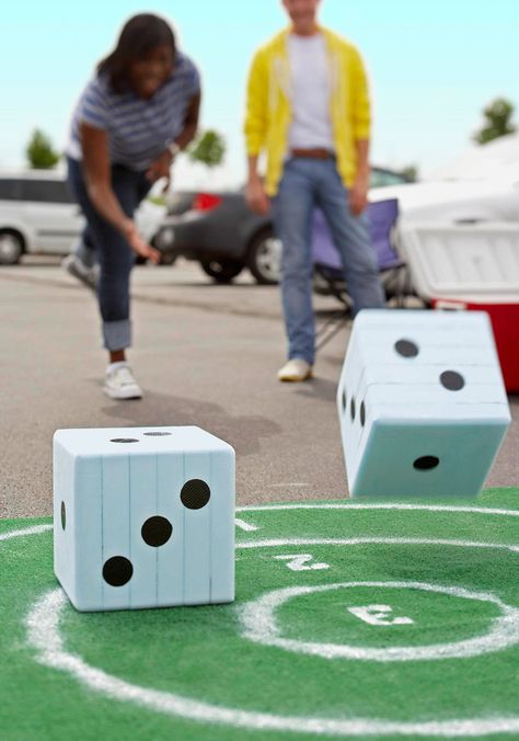 Diced Darts Game- Diced Darts gets kids excited to practice their multiplication or addition skills! "Take turns rolling two oversize foam dice toward a dartboard-like target of rings. Score points by multiplying the number showing on each die by the number of the ring it lands in." via Lowe's Creative Ideas. (Note: You can adjust the game by adding the number showing on each die to the number of the ring it lands on for smaller children.) Buffett Ideas, Fall Tailgating, Tailgating Ideas, Theater Decor, School Fair, Darts Game, Spring Carnival, School Carnival, Class Games