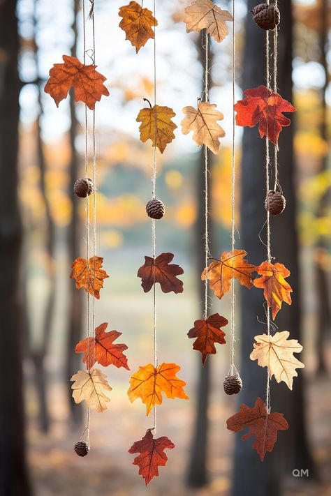 Hanging autumn leaves and pinecones in a forest setting. Cozy fall decor idea, perfect for adding a touch of fall home decor to your space. Autumn Leaf Garland Diy, Fall Leaves Decorations, Autumn Leaf Decorations, Autumn Leaves Decor, Fall Restaurant Decorations, Nature Party Decor, Natural Fall Decorations, Autumn Tree Decorations, Thanksgiving Craft Decorations