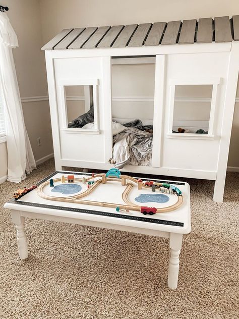 I found this table on marketplace for free, I was originally going to use it in our kitchen, but I found another table that fit better in our "breakfast nook." I didn't know what to do with this table, but I got an idea when my baby kept trying to play with his train tracks in his bedroom (which is all carpet) and it wasn't working too well for him. I kept looking for train tables for his room that weren't too expensive, but were cute and had no luck, so I figured I'd make him one i… Diy Car Table, Painting Particle Board Furniture, Diy Train Table, Tractor Table, Barn Quilts For Sale, Linen Spray Recipe, Diy Train, Mountain Mural, Building A Kitchen