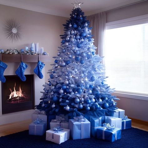 A gradient tree featuring navy-to-sky blue tones is a perfect holiday statement. Silver decor adds sparkle, while warm lights create a welcoming glow. Navy Blue Christmas Tree, Blue Christmas Trees, Navy Blue Christmas, Holiday Aesthetic, Blue Christmas Tree, Christmas Blue, Silver Decor, Silver Ornaments, Blue Christmas