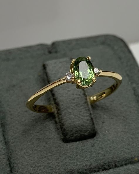 Certificated Sri Lanka Green Sapphire Dainty Ring with Diamond in Solid 14K Gold, September Birthstone, Genuine Gemstones, Best Gift for her ◎ Details ◎ ○ Gemstone Details .Natural GREEN SAPPHIRE Oval Cut 6x4 mm approx. 0.60 ct (can be between 0.55 ct - 0.70 ct) .Genuine DIAMOND Round Cut 1.50 mm - 2 pcs G VS / SI approx. 0.04 ct ○ Gold Details 14K Solid Gold Weight of Ring : approx 1.70 gr Made to Order HANDMADE ITEM ○ Upgrade to Solid 18K Gold, please click the link below: https://www.etsy.com Cheap Green Crystal Ring, Green Gold Rings, Green Ring Gold, Wedding Rings Green, Green Gold Ring, Ruby Ring Designs, Latest Ring Designs, Green Diamond Ring, Fashion Jewelry Necklaces Gold