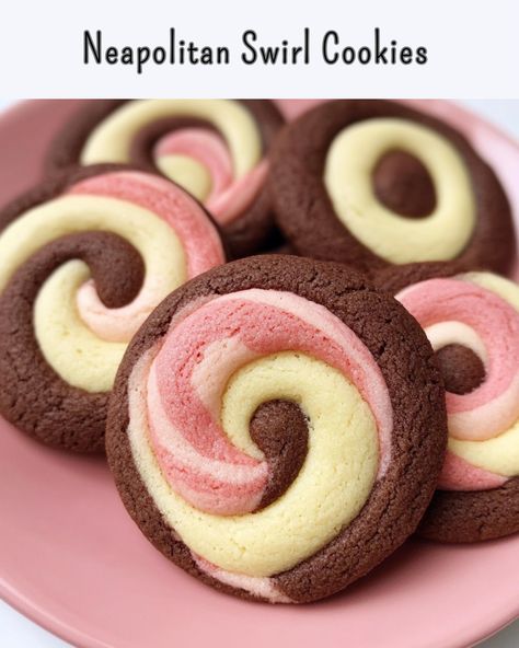 Neapolitan Swirl Cookies These colorful and delicious swirls of chocolate, vanilla, and strawberry make the perfect treat! Ingredients: 2 ¾ cups all-purpose flour 1 cup unsalted butter, softened 1 cup granulated sugar 1 large egg 1 tsp vanilla extract ¼ tsp salt 1 tbsp cocoa powder 2 tbsp strawberry powder (or freeze-dried strawberries, finely ground) Pink food coloring (optional) Directions: Preheat the oven to 350°F (175°C). Line a baking sheet with parchment paper. In a large bowl, cr... Neopolitan Cookies Italian, Neapolitan Cookies, Swirl Cookies, Strawberry Powder, Pink Cookies, Pink Food, Pink Food Coloring, Freeze Dried Strawberries, Dried Strawberries