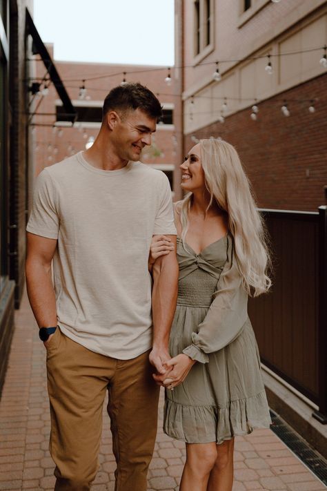 Downtown Anniversary Photos, Fall Engagement Pictures Downtown, Light Green Dress Engagement Pictures, Mens Engagement Outfits Summer, Downtown Couple Pictures, Downtown Engagement Photos Plus Size, Couple Session Photography Outfit Ideas, Denim Engagement Photos Outfit Ideas, Engagement Photos Outfits Dress