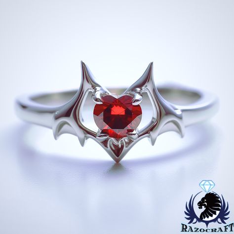 I think we've ALL fallen in love with a vampire or two during our lives, so we created a special "Drac's Daughter" Inspired engagement ring, perfect for the dark and alluring, vampiric bride!  Comes in your choice of solid sterling silver or solid white gold, Featuring a brilliant Swarovski Blood Ruby that can be exchanged if red isnt your color! Also, if you want it in black gold, feel free to shoot us a message, and we will be happy to make a custom version especially for you! Starting Price: Black And Red Accessories, Vampire Engagement Ring, Vampire Rings, Gothic Accessories Jewellery, Red Wedding Ring, Vampire Ring, Engagement Ring Ruby, Vampire Jewelry, Blood Ruby