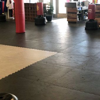 “They made it 16 years, and we didn’t even have to flip them over,” Troy said. “The only time we flipped them over was just to change the color of the sparring ring. … You can find (puzzle mats) anywhere, but to find them durable enough to last… nothing lasts 16 years anymore. It’s almost impossible to find anything that’s going to last 5 years, let alone 16.” Stockbridge Tae Kwon Do Academy Martial Arts Mats, Interlocking Foam Mats, Interlocking Floor Tiles, Interlocking Foam Tiles, Foam Mat Flooring, Basement Gym, Foam Tiles, Tae Kwon Do, Puzzle Mat