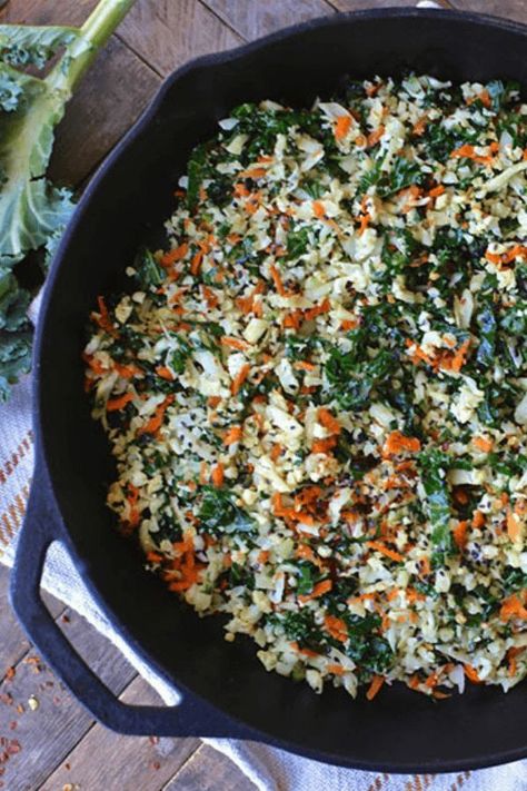 Cauliflower Fried Rice with Kale Recipe. Filled with all the flavors of traditional fried rice but with a nutritional twist, cauliflower, rice,pieces combined with kale, carrots, green onion, cilantro, sesame seeds and spices! #cauliflower #friedrice #kale #healthyside #healthymeal #elisemuseles Cauliflower Rice Recipes Healthy, Kale Chicken Salad, Fried Kale, Kale Recipe, Rice Recipes Vegan, Chicken Kale, Cauliflower Fried, Cauliflower Rice Recipes, Cauliflower Fried Rice