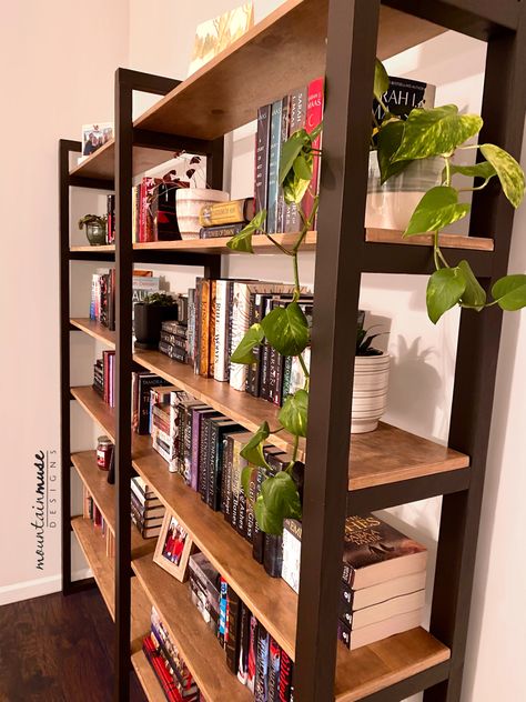 Industrial style bookshelf with black painted ladder uprights and plywood shelves. Side By Side Bookshelves, Diy Open Shelf Bookcase, Bookshelf Wood Design, Backless Bookshelf, Diy Wood Bookshelf, Bookshelf Hallway, Free Standing Bookshelves, Bookshelf Ideas Living Room, Double Bookshelf