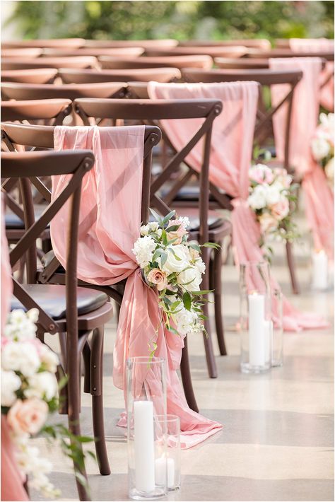 brown chairs with pink fabric draped | The Refinery at Perona Farms Wedding with industrial vibe and spring color palette photographed by NJ photographer Idalia Photography. Planning an industrial spring wedding? Find ideas here for your big day! Wedding Pink Decoration, White Wedding Pink Accents, Blush Pink Backyard Wedding, Wedding Chair Drapes, Pink And Brown Wedding Decorations, Powder Pink Wedding Decoration, Dusty Rose Aisle Decor, Brown And Pink Wedding Theme, Spring Wedding Aisle Decor