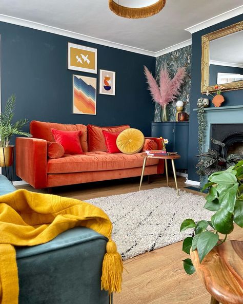 Blue Living Room Orange Sofa, Blue Walls Orange Sofa, Red Couch Blue Walls, Orange And Navy Living Room, Blue Orange Room, Blue And Orange Interior, Blue Orange Living Room, Orange Sofa Living Room, Orange And Blue Living Room