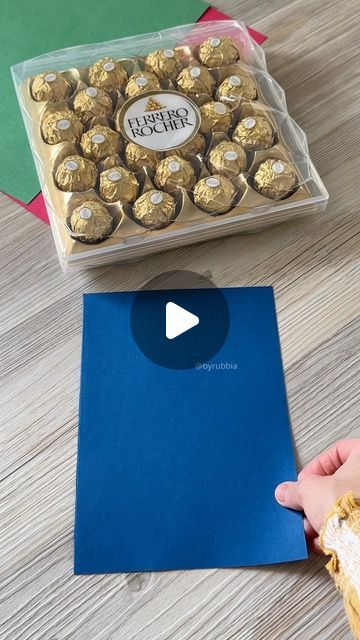 Rubbia on Instagram: "Chocolate Party Favours   #fyp #ferrerorocher #flowers #gift #giftideas #gifthampers #byrubbia #instagood #presents #anniversary #wedding #occasion #explore #chocolate #ideas #tips #diy #london #partytreats #giftwrapping #giftwrap" Diy Chocolate Gift Basket, Chocolate Box Wrapping Ideas, Lindt Chocolate Gift Ideas Christmas, Gift Favors Ideas Birthday, Christmas Dessert Gift Boxes, Christmas Favours Ideas, Chocolate Giveaways Ideas, Chocolate Wrapping Ideas Packaging, Chocolate Wrapper Craft